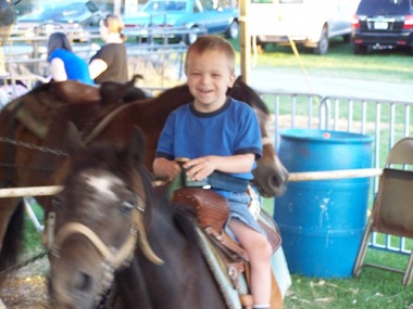 Riding a horse at the Ozark Empire Fair