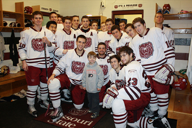 Vincent and the MSU Ice Bears team in 2011.
