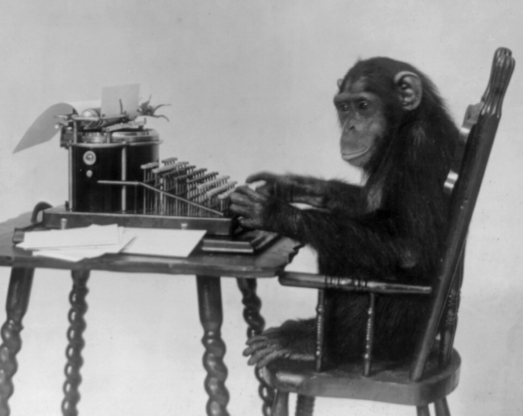 Code Monkey seated at typewriter